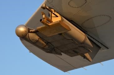 The CAPS instrument attached to the exterior of the NASA DC-8 aircraft.