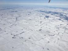 Image of snow-covered fields taken from an aircraft ACT-America Fall 2017 flight