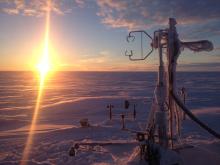 Frost clings to an eddy covariance tower in Barrow, Alaska. The sensors measure methane emissions year round and are equipped with deicers to prevent them from malfunctioning in the Arctic’s frigid temperatures. The tower also measures other meteorological variables, including air temperature, humidity, soil temperature, and soil moisture. (Courtesy S. Losacco) Frost clings to an eddy covariance tower in Barrow, Alaska. The sensors measure methane emissions year round and are equipped with deicers to prevent them from malfunctioning in the Arctic’s frigid temperatures. The tower also measures other meteorological variables, including air temperature, humidity, soil temperature, and soil moisture. (Courtesy S. Losacco)